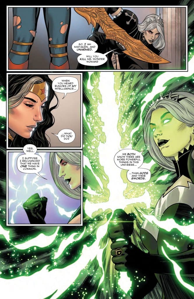 A comic book panel showing a confrontation between two female characters, one resembling Wonder Woman and the other with silver hair and a powerful aura, discussing intelligence and power, with energy effects surrounding them.