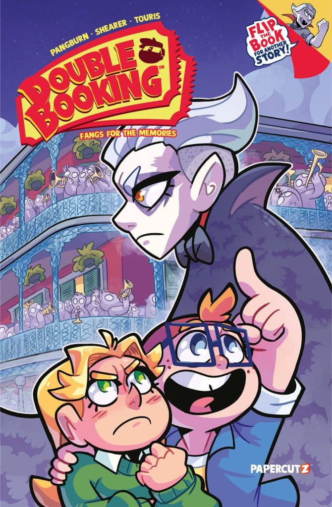 Cover of the comic 'Double Booking: Fangs for the Memories', featuring two cartoon characters in the foreground looking concerned and excited, with a dramatic character in the background. The title is prominently displayed at the top, and there are colorful illustrations of ghostly figures and a balcony scene.