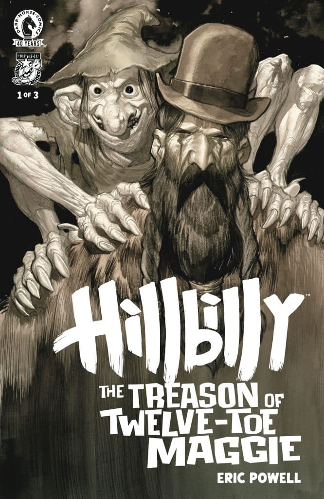 Comic book cover featuring a mysterious bearded man in a top hat and a grotesque creature with a pointed hat, set against a dark background. The title 'Hillbilly: The Treason of Twelve-Toe Maggie' is prominently displayed at the bottom.