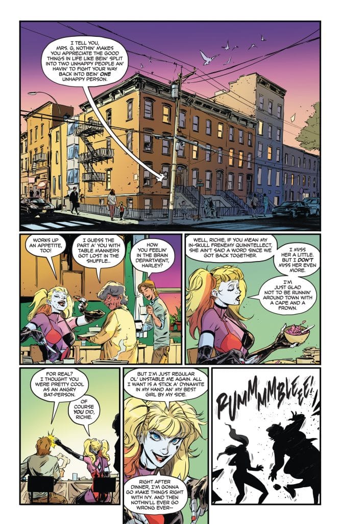 Comic book panel featuring a conversation between two characters in an urban setting, with brownstone buildings and a colorful sunset in the background. One character, depicted with blonde hair and a playful expression, interacts with another character seated at a table. The scene includes captions and speech bubbles, suggesting a light-hearted dialogue.