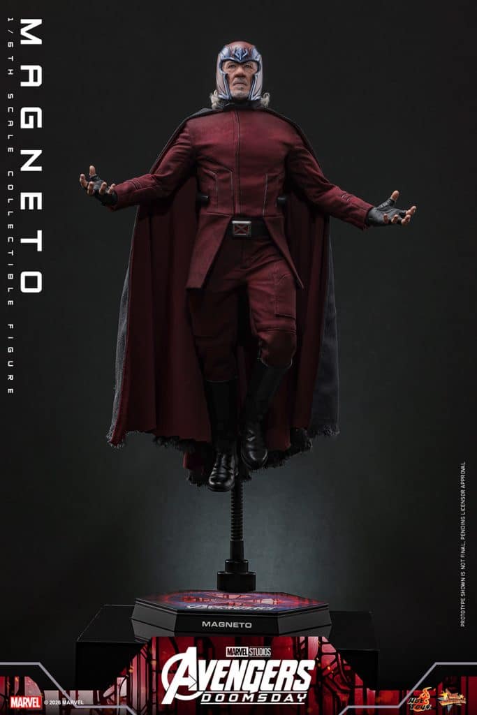 A highly detailed collectible figure of Magneto in 1/6 scale, depicted in a dynamic pose with arms outstretched, wearing his iconic red costume and helmet, displayed on a themed base.