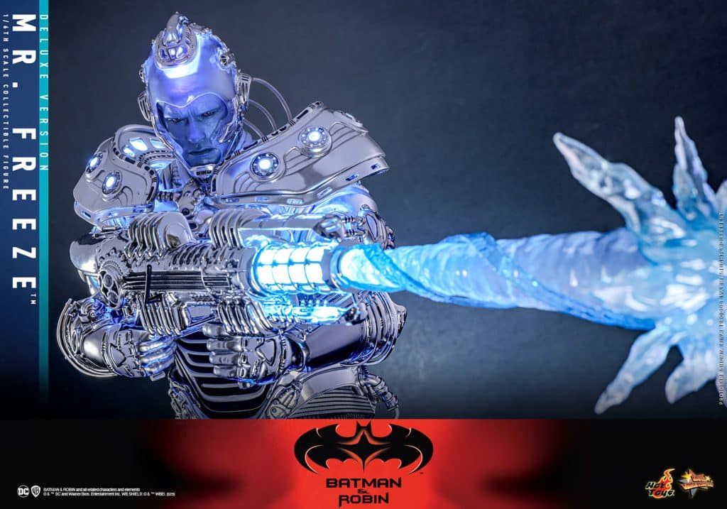A collectible figure of Mr. Freeze from Batman and Robin, featuring a shiny metallic finish and holding an ice weapon that emits a blue light.