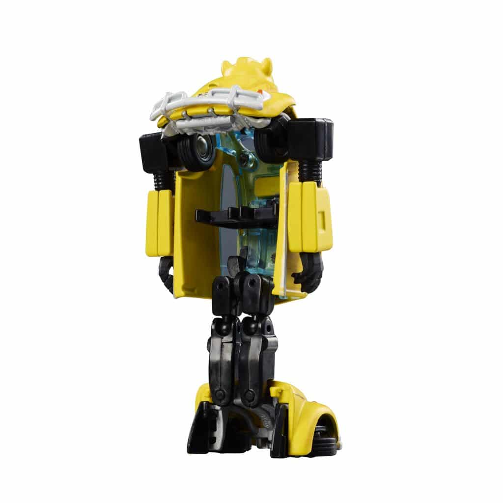 A yellow robot toy with a transparent section, standing upright with articulated limbs and black accents.