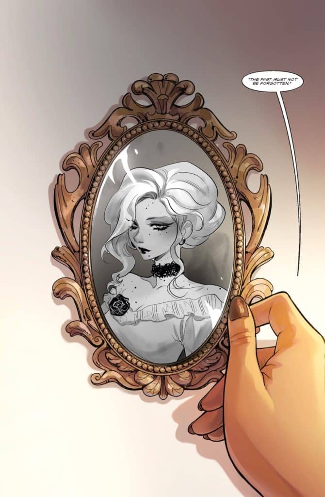 A hand holds an ornate vintage mirror reflecting a woman with long wavy hair and a somber expression. She wears a ruffled off-the-shoulder top adorned with a dark flower and jewelry, while the background features a soft gradient. A quote appears above her: 'The past must not be forgotten.'