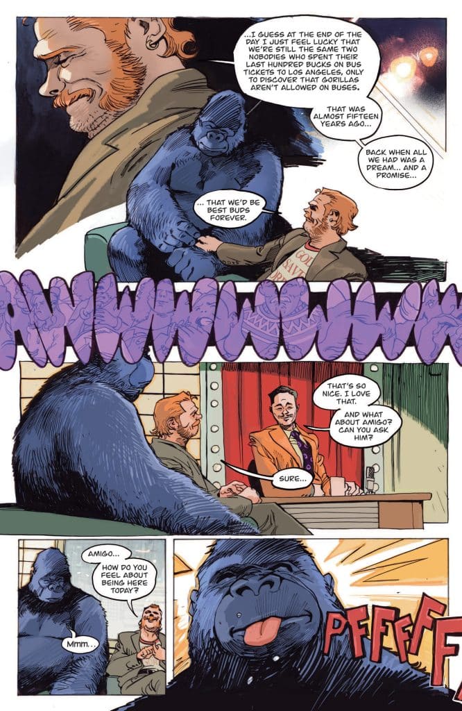 A comic panel featuring a gorilla and two men engaged in conversation on a talk show set, with colorful graphics and speech bubbles.