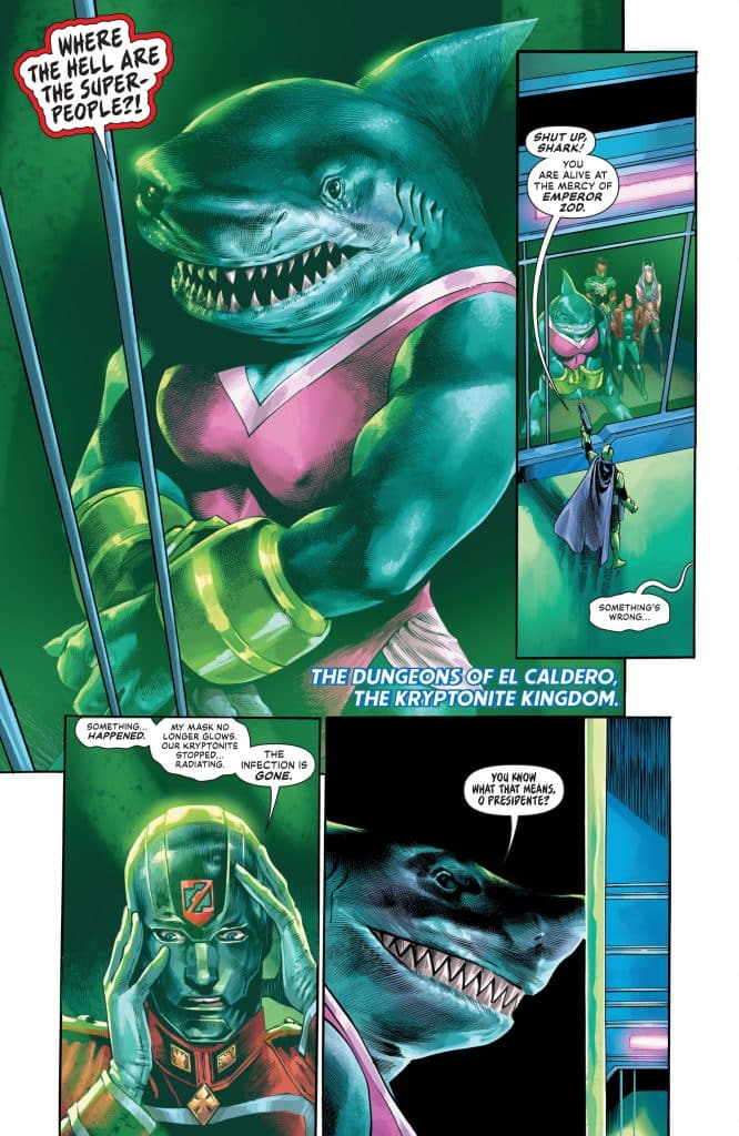 A comic panel featuring a humanoid shark character in a pink costume, expressing frustration in a prison-like setting. Other characters discuss a crisis involving Emperor Zod. The scene conveys tension and urgency.