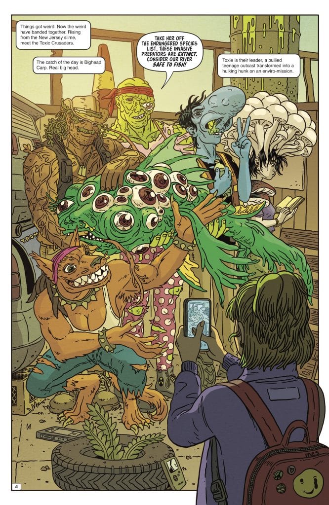 A colorful comic-style illustration of a quirky group of characters, including a monster with a large head and multiple eyes, a teenage girl with tentacles, and a muscular creature with a plant-like appearance, posing together in front of a backdrop of urban elements like tires and graffiti.