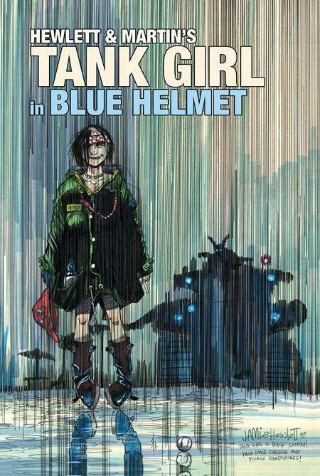 Cover art for 'Tank Girl in Blue Helmet' featuring a female character with short black hair dressed in a green jacket and black shorts, standing confidently in front of a large tank-like vehicle, with a stylized, colorful background.