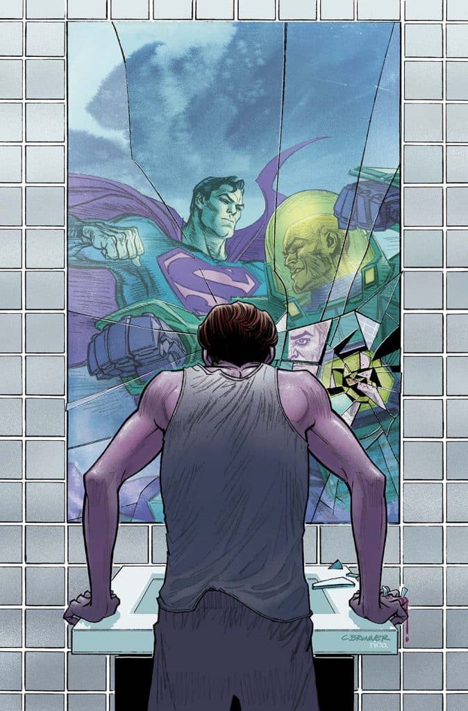 A person stands at a sink looking at a broken mirror, reflecting an illustration of Superman and his adversaries.