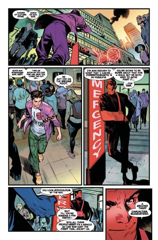 A comic panel depicting two characters in a busy city setting, one wearing a purple outfit and the other in a black suit, engaged in conversation. The background shows a building with a sign reading 'EMERGENCY' and a crowded street.