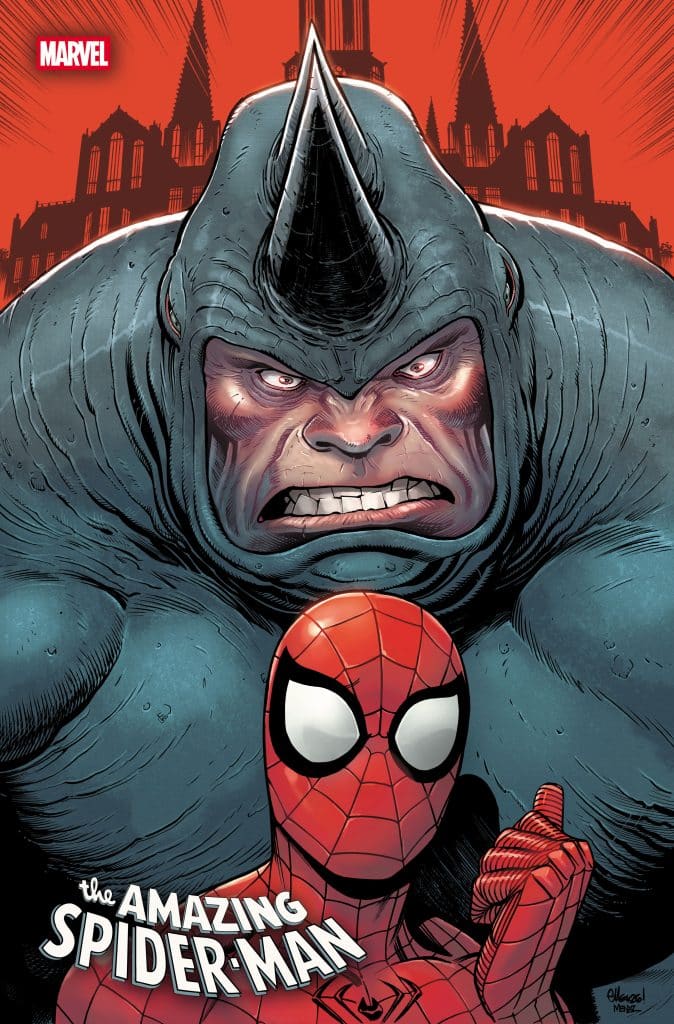 Comic cover featuring Spider-Man in a red and blue suit, standing in the foreground with a confident pose, alongside a menacing character with a spiked head, set against a dramatic red backdrop and gothic buildings.