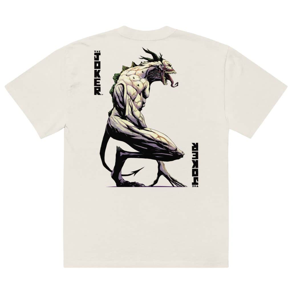 Graphic t-shirt featuring a stylized illustration of a monstrous version of the Joker, with the text 'THE JOKER' and 'JOKER' on either side.