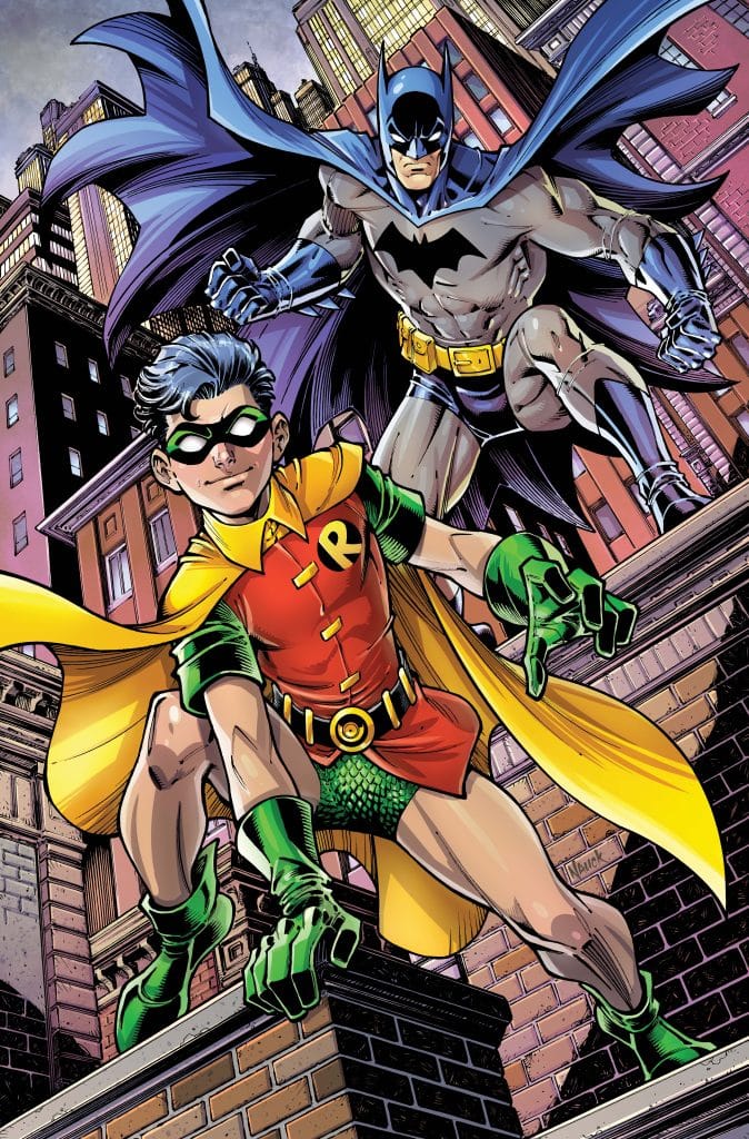 A stylized comic book illustration featuring Batman and Robin. Batman, in a dark costume with a cape, stands prominently behind Robin, who is clad in a vibrant red and green outfit. They are posed heroically atop a building with a city skyline in the background.