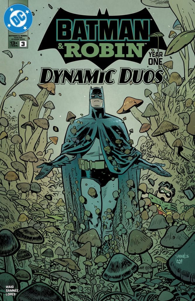 A comic book cover featuring Batman standing among large mushrooms, with the title 'Batman & Robin Year One: Dynamic Duos' prominently displayed.
