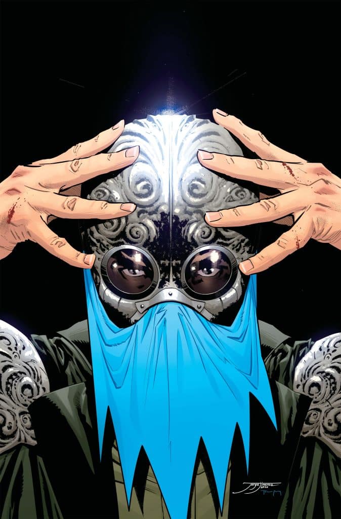 A character wearing a detailed helmet with intricate designs and goggles, partially obscured by a blue cloth, with hands touching the helmet's surface, set against a dark background.