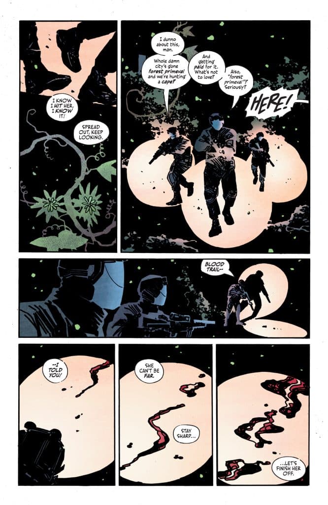 Comic panel depicting three characters in dark clothing searching through a forest, discussing a blood trail. One character is highlighted with a flashlight, while the others are positioned menacingly, ready for action.