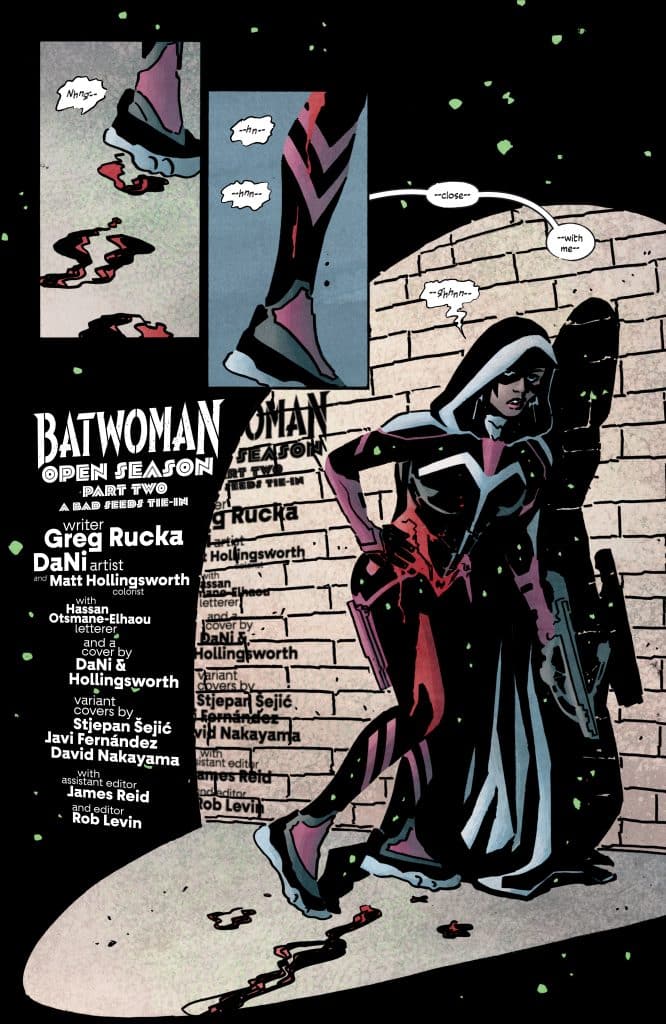 A comic book page featuring Batwoman in a dramatic pose. She wears a stylized costume with pink and dark colors. The background includes a brick wall and dialogue text boxes with sounds and conversation. The title reads 'Batwoman Open Season Part Two.'