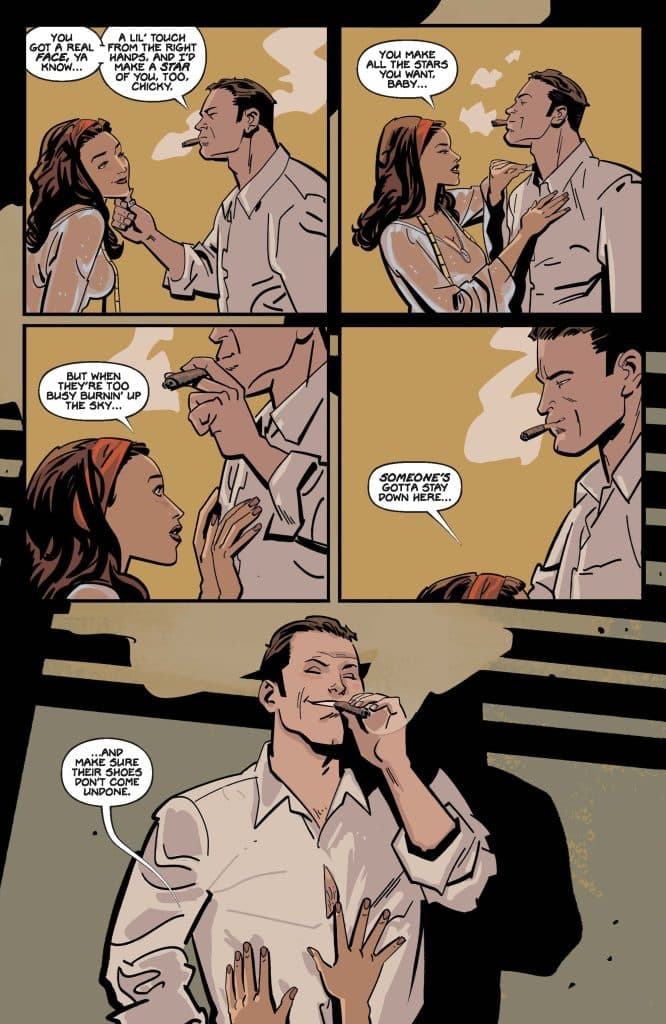 A comic panel featuring a romantic interaction between two characters, with one character playfully touching the other's face while the other smirks and holds a cigar. The background is an abstract blend of colors that sets a soft, intimate mood.