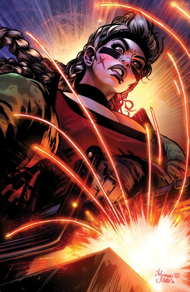 A powerful female character with a fierce expression, wearing a mask and a red outfit, is in an action pose as bright sparks and explosions surround her.