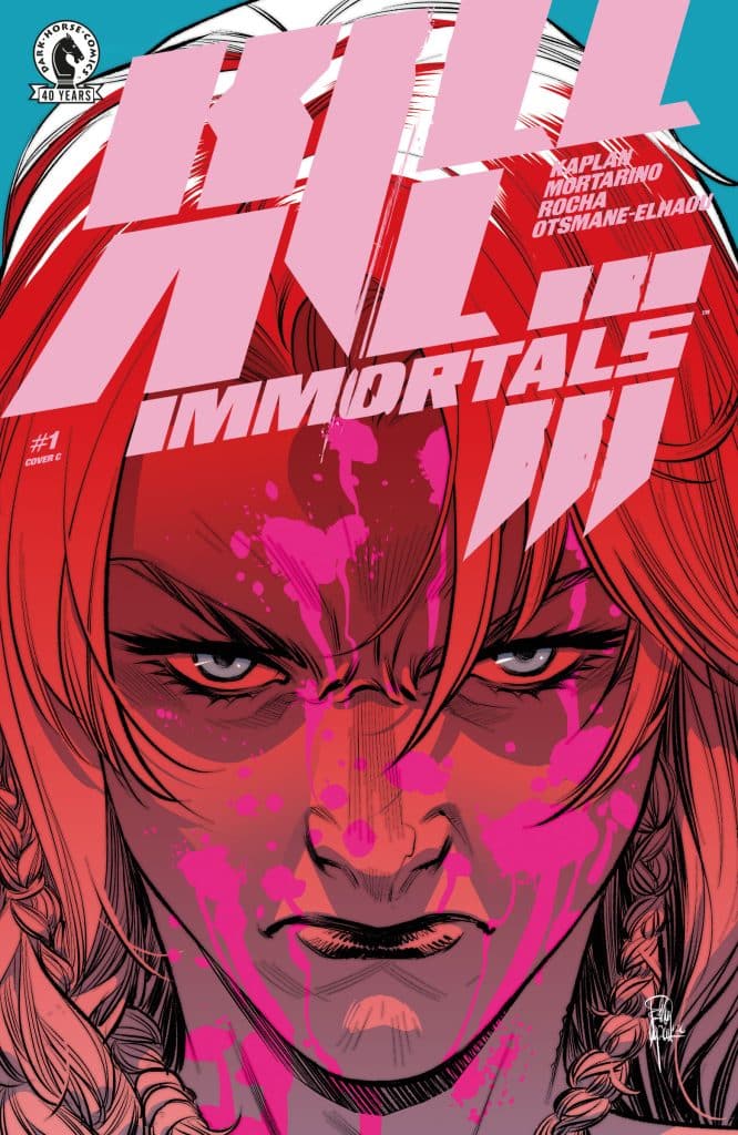 Cover art for 'Kill Immortals #1' featuring a fierce woman with intense facial expression and bright pink paint splatter effects.
