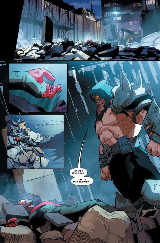 A comic book scene depicting a character in a helmet and armor standing over rubble with a defeated figure in the foreground. The character appears menacing, with a speech bubble stating, 'You're not dead. That's inconvenient.'