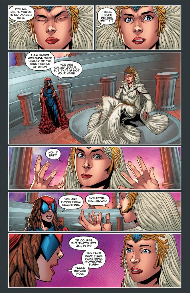 A comic panel featuring two female characters engaged in a conversation, one dressed in a flowing gown with long hair, the other in a costume with a mask. The scene takes place in a circular, ornate room.