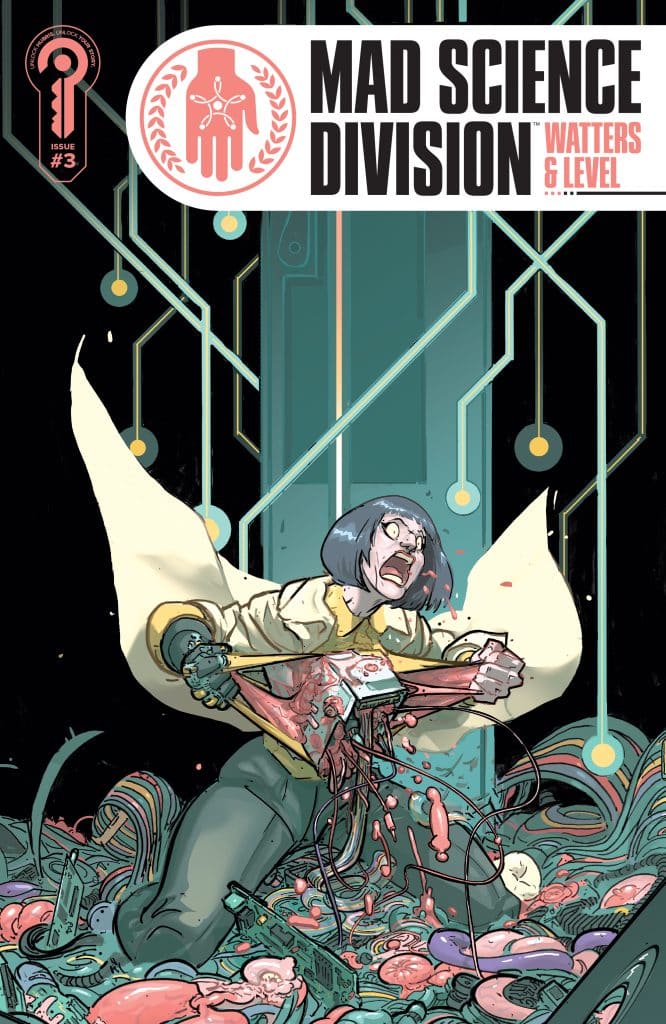 A frantic scientist in a yellow lab coat is struggling with a strange, bloodied device amidst a chaotic background filled with colorful, organic-like materials and electronic components.