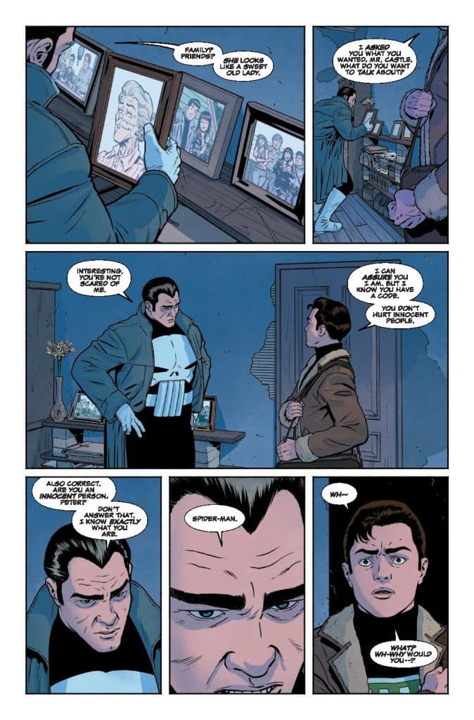 A comic book panel featuring two characters engaged in a tense conversation. One character stands with a serious expression, looking at pictures on the wall, while the other character, dressed in casual attire, appears anxious. The dialogue hints at themes of morality and identity, mentioning 'Spider-Man' and innocence.