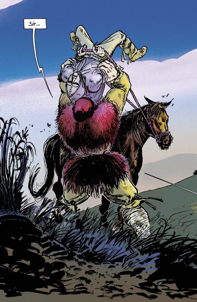 A person in a colorful, fur-trimmed outfit is lifting another individual, who appears to be bound, while sitting on a horse in a mountainous landscape.