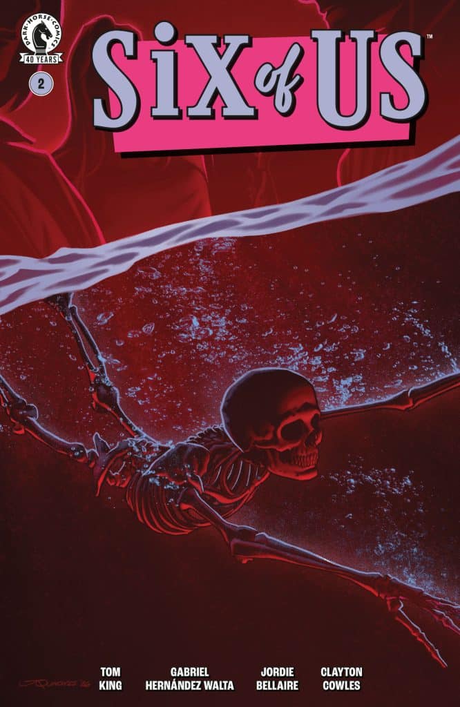 Cover of 'Six of Us' comic book issue 2, featuring a skeleton swimming underwater with red tones and bold pink title.