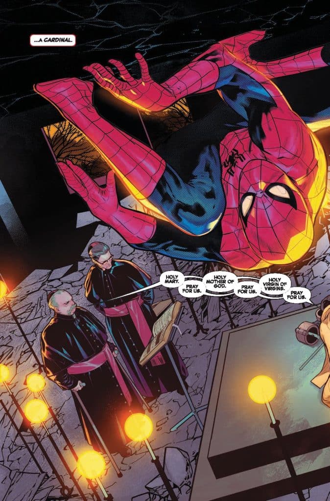 Spider-Man suspended upside down in a dark setting, with two cardinals in religious attire standing by a table. Candles are lit around them, and a prayer is being recited.