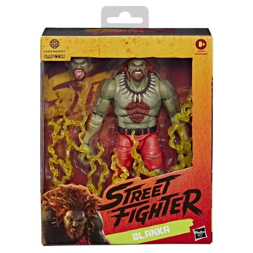 Action figure of Blanka from the Street Fighter video game series, displayed in its packaging with electric effects and alternate head.