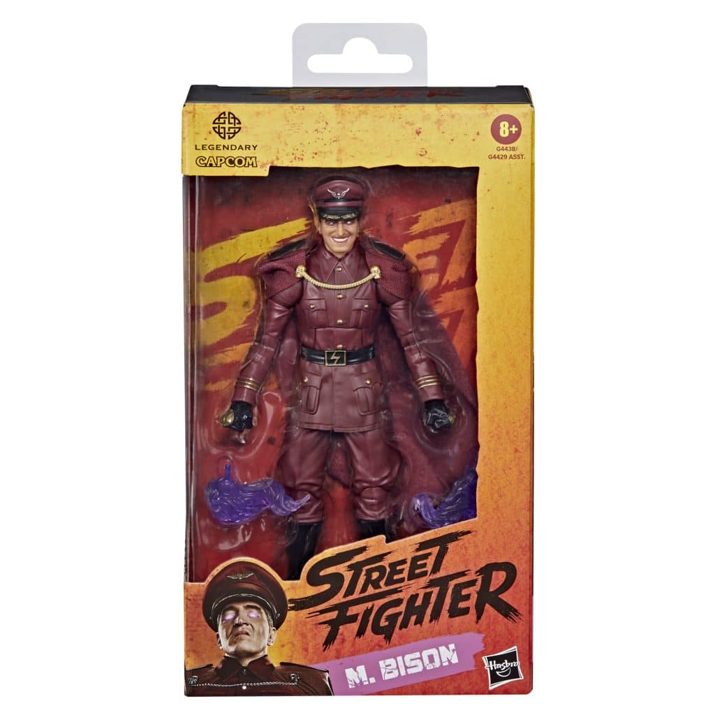 Action figure of M. Bison from the Street Fighter video game series, packaged in a colorful box with a window display.