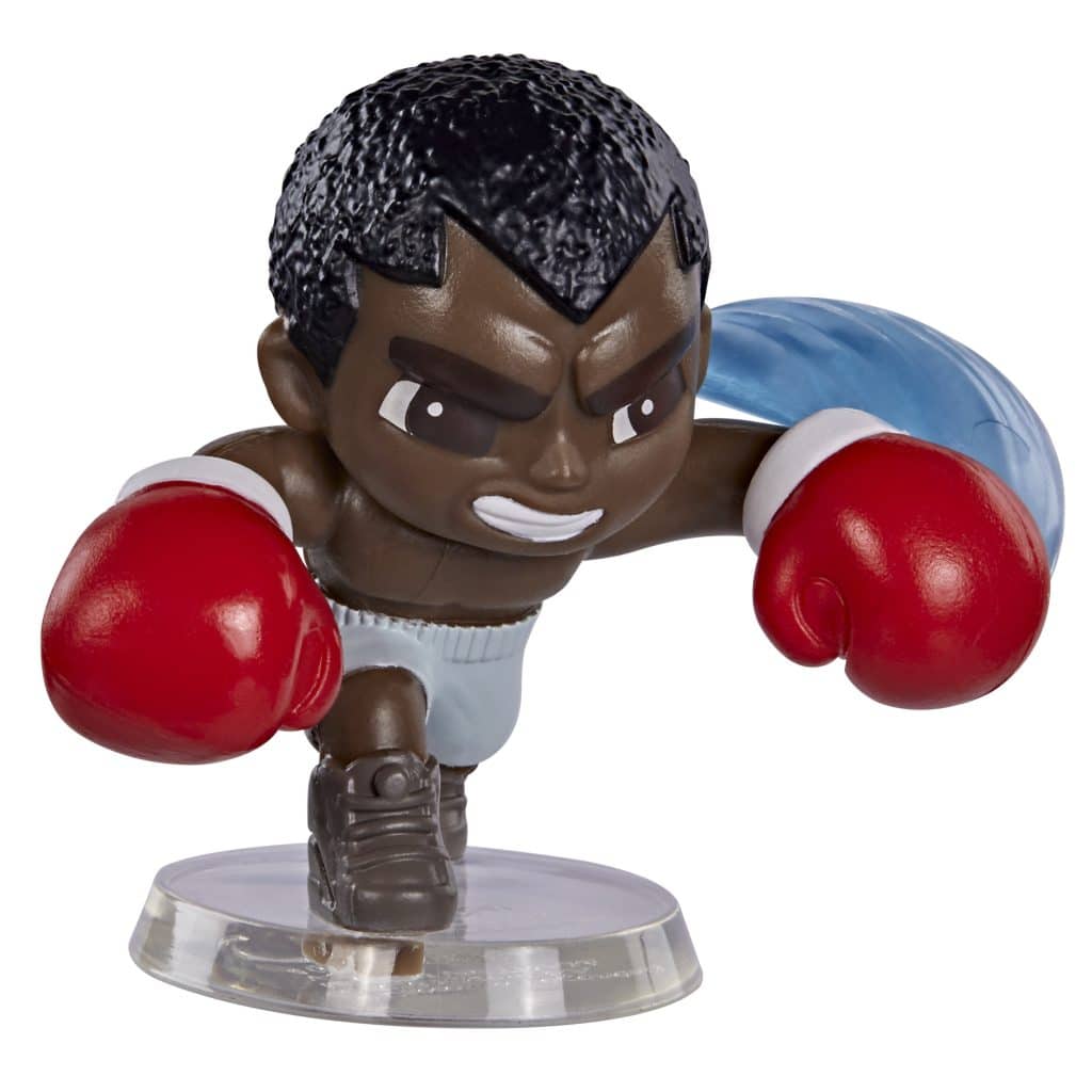 A colorful action figure of a boxer in a fighting stance, wearing red boxing gloves, blue shorts, and a confident expression.