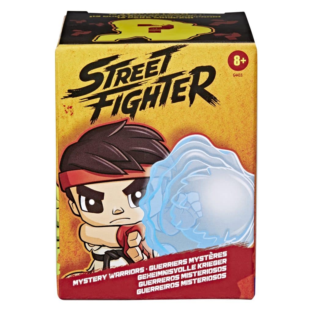 Box packaging for Street Fighter Mystery Warriors featuring a cartoon character with a blue energy attack.