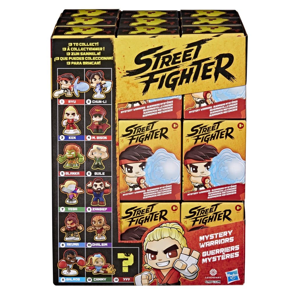 Display box of Street Fighter collectible figures featuring characters like Ryu, Chun-Li, and Ken, with a total of 13 characters to collect, highlighted by a mystery figure section.