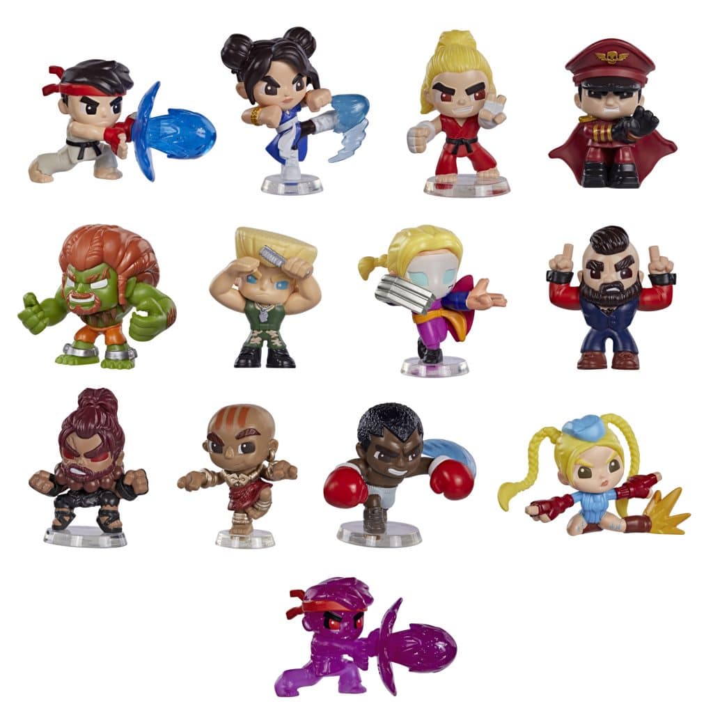 Collection of colorful action figures inspired by a fighting video game, featuring various characters in dynamic poses with unique accessories.