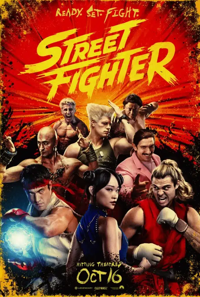 Promotional poster for the movie 'Street Fighter,' featuring multiple characters in dynamic poses, a fiery background, and text that reads 'READY. SET. FIGHT.' and 'Hitting Theatres Oct/16.'