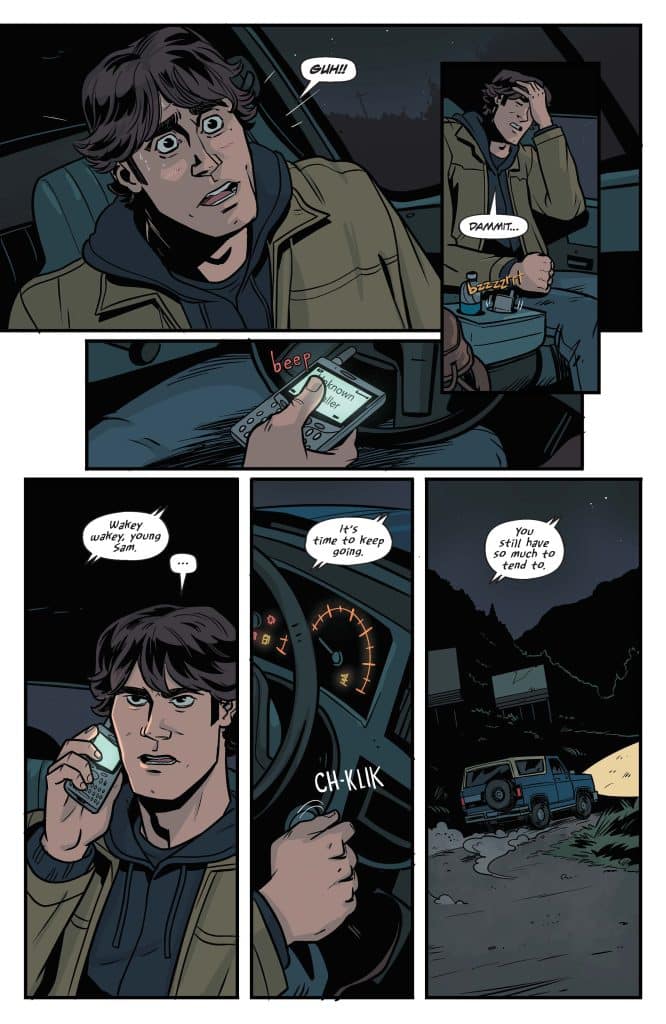 A young man with wavy hair, looking concerned, speaks on a cellphone while seated in a vehicle. The dashboard displays various lights, and a blue vehicle is seen outside in the dark.