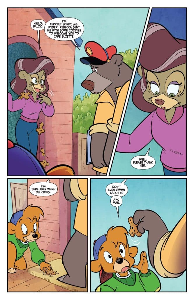 A bear wearing a red cap greets a woman with long hair, offering cookies as a welcome gesture, while a small dog watches with excitement. The scene takes place outside a colorful building.