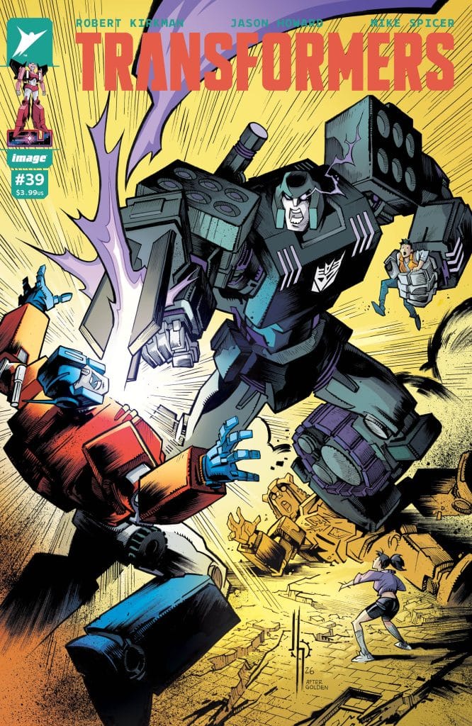 Cover of Transformers comic #39 featuring two large robotic characters in battle, with one robot attacking while a humanoid figure watches in the foreground.