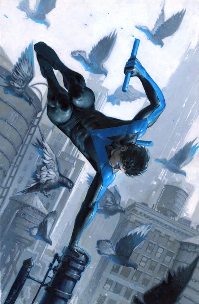 A superhero in a black and blue costume is perched on a rooftop, surrounded by flying pigeons, against a city skyline backdrop.